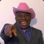 Tyrone wearing a pink cowboy hat