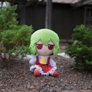 Yuuka Kazami next to foliage