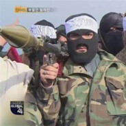 الرجل ذو البنادق