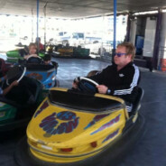 Elton John in a bumper car