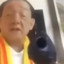asian man with gun