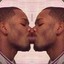 2 Black men kissing