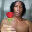 Black Guy Holding Flower