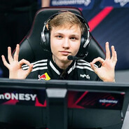 :>
