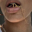 ♱