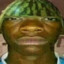 Watermelon on a black man head
