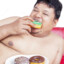 guy eating donuts