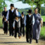 A group of amish goat milkers