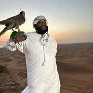 Rick Ross Holding An Eagle