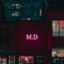 M.D