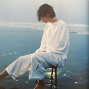 雨の街路に夜光蟲