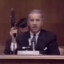 Joe Biden holding a Tec-9