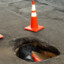 4 FOOT DEEP POTHOLE