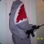 shark with a gun