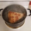 boiling pizza