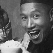 Man Enjoying Rice