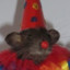 Rat in clownskleding