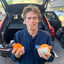 Willem Dafoe showing 2 oranges