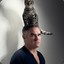 Morrissey with a cat on his head