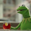 Kermit drinking tea