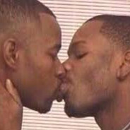 2 Black Men Kissing