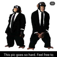 Two Chimps in Suits