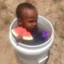 Grabbed watermelon in a Bucket