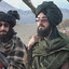 COACH TALIBAN OLLE