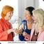 3 white moms with wine