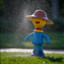 sprinkler with a hat