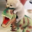 Primitive Cat Riding A Dino