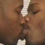 Two Black Men Kissing