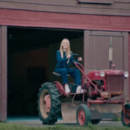 white woman on a tractor