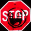 stop sign with graffiti