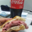 Pan con mortadela y coca