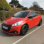 2013 peugeout 208 gti (red)