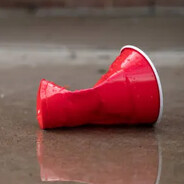 sad used leftover red party cup