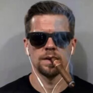 T.