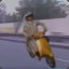 Moktar sur son scooter doré