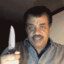 Neil deGrasse Tyson with a Knife