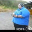 fat guy with gun shooting