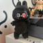Black Labubu PEEK