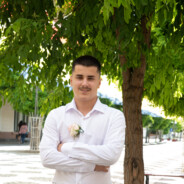 aT