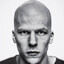 threatening bald man