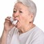 grandma taking inhaler